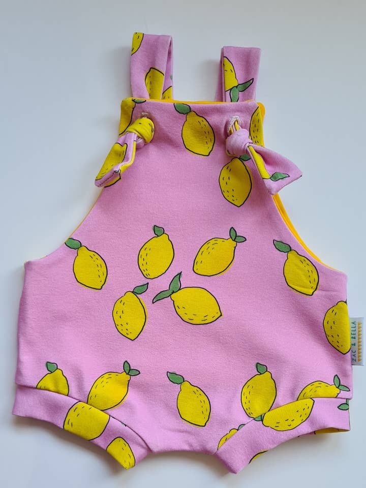 Pink Lemonade Summer Romper for wholesale by Zac & Bella