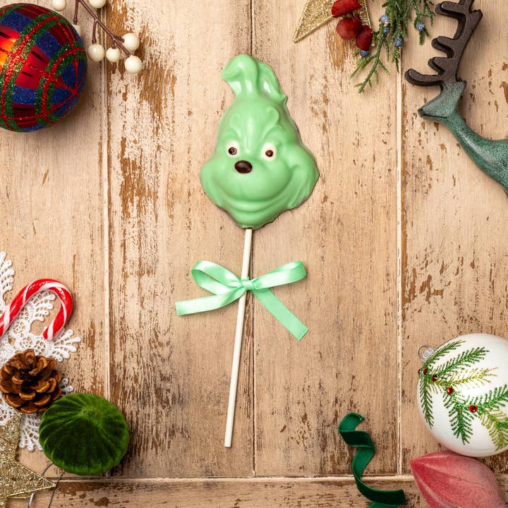 Sucette Grinch pour la vente par Enjou Chocolat