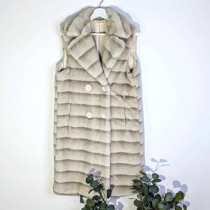 Luxury shaded faux fur long gilet with pockets for wholesale by Tempest Designs