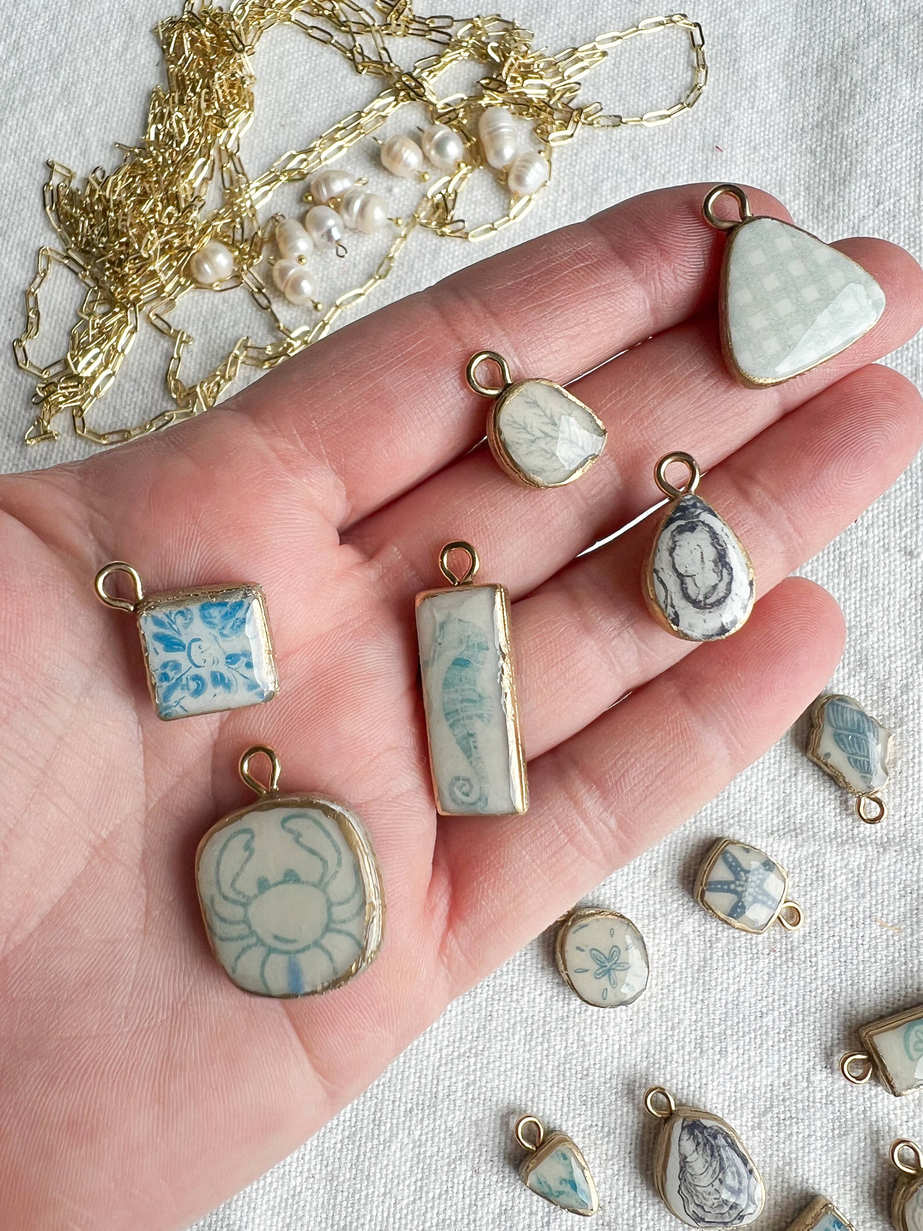 Morning Dew Designs - Vente Breloques/médailles personnalisées - Papiers de transfert à thème nautique conçus pour des breloques en argile polymère1