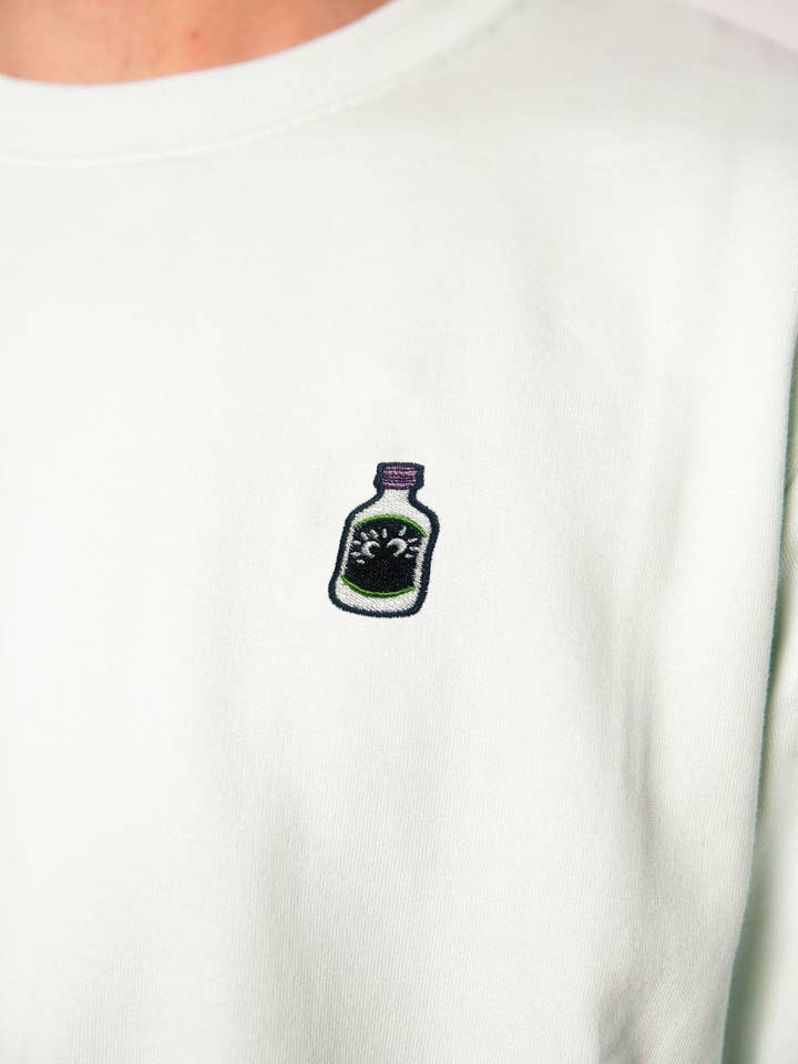 Little Coward | Broderet økologisk bomuld herretrøje for engroshandel hos Fashion Drinks