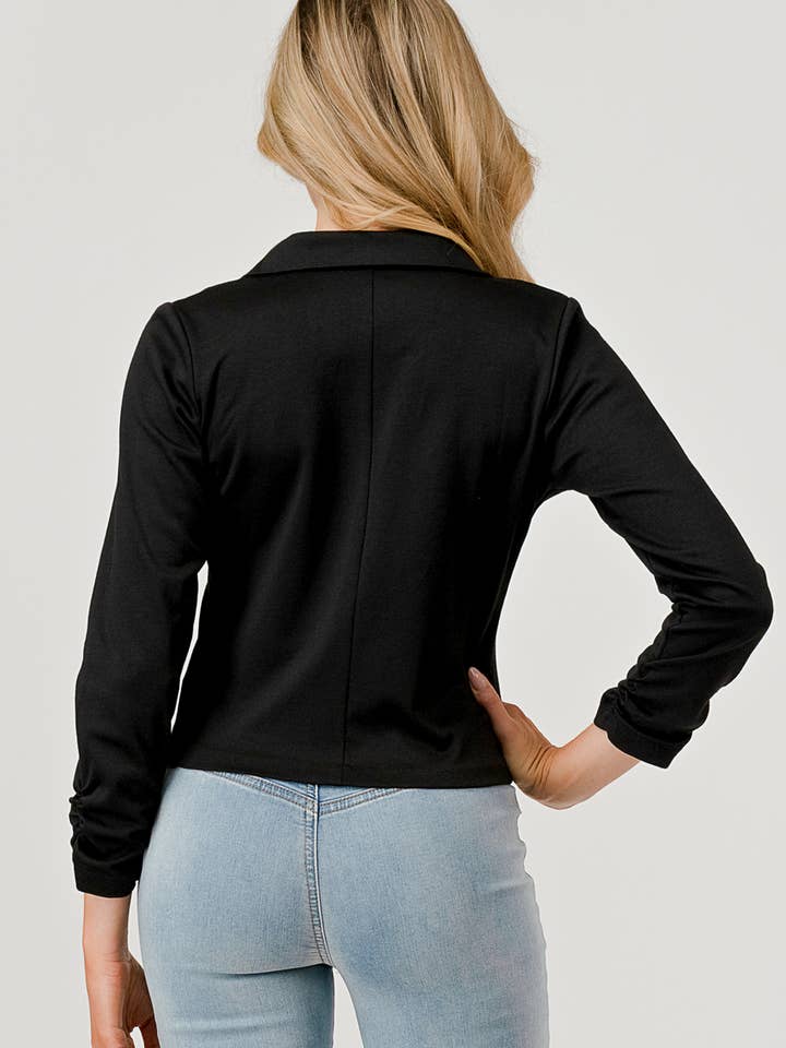 Noir Blazer à manches froncées avec revers cranté et bouton doré simple en vente sur Faire2