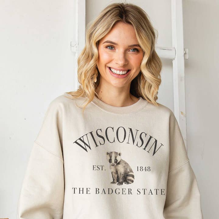 WISCONSIN THE BADGER STATE Oversized Graphic Sweatshirt and other Purchase Wholesale badger. Free Returns & Net 60 Terms on Faire trending on Faire.