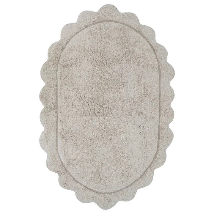 Alfombra infantil ovalada MARISA color crudo con borde en ondas 100x150cm para venta al por mayor de Nenina & Co