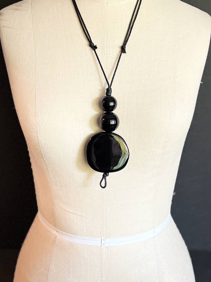 WISDOM: A Stylish Bold Pendant in Classic Black Resin Beads for wholesale by Alter Ego Designs