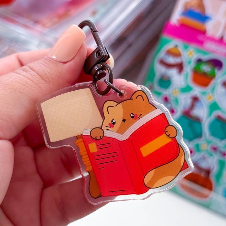Cozy Chubbs Cat Book Reading Acrylic Keychain for wholesale by Pochistudios