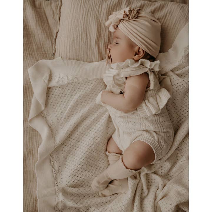 koffiemelk Crèmekleurige gebreide heirloom-deken voor groothandel op Faire1