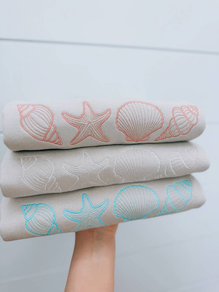 seashells embroidered sweater for wholesale by Meghan Ashley Designs Inc.