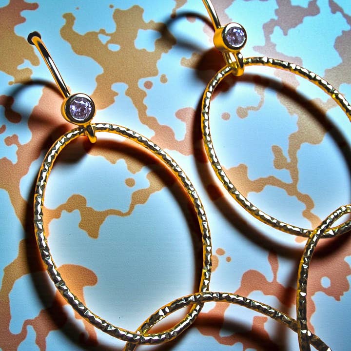 INFINITY øreringe i 925 sølv (forgyldt) med zirkonia for engroshandel hos Grethe Winter