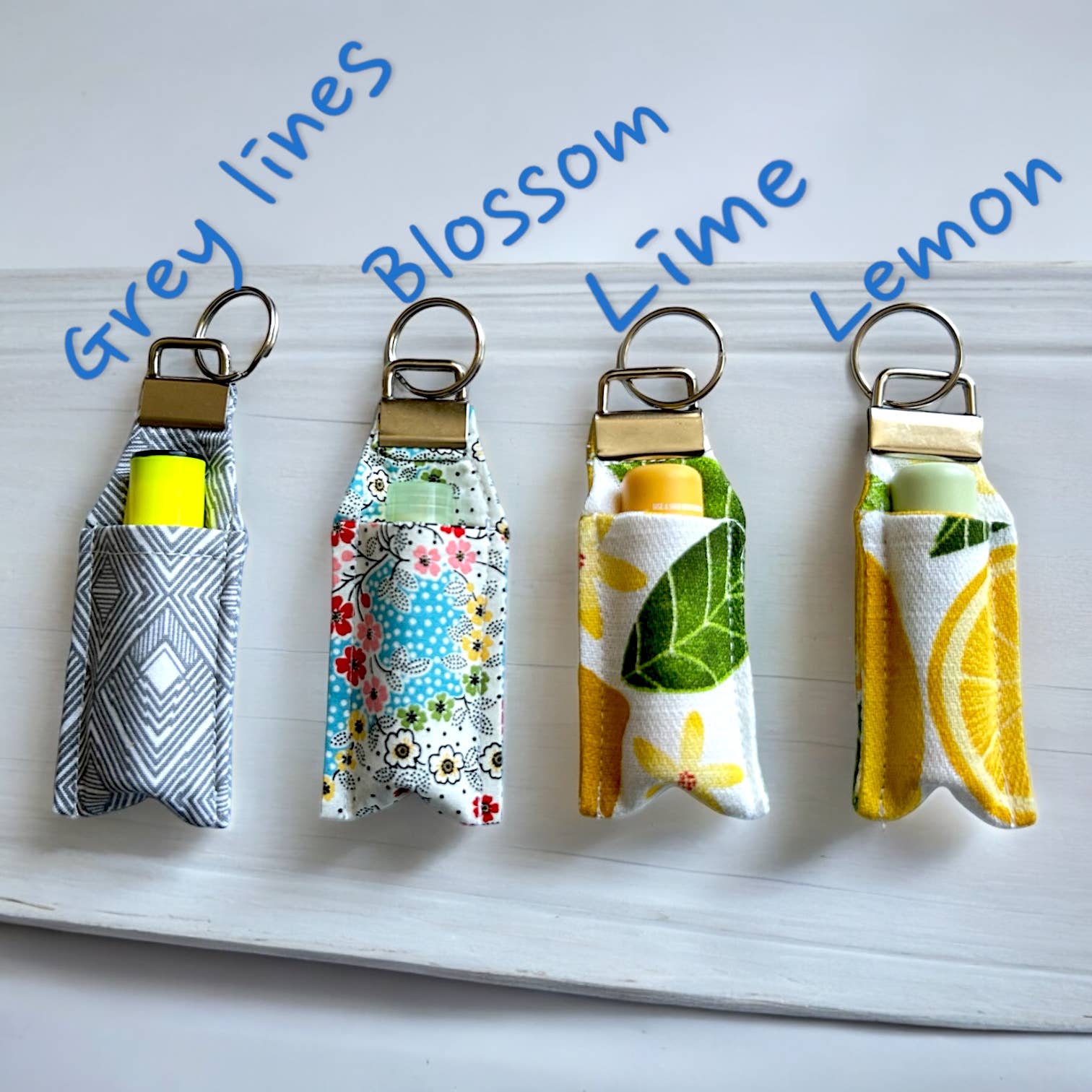 Jolly Bundles - Vendita all'ingrosso Custodia per burro di cacao - Porta balsamo per le labbra con stampa limone e anello porta chiavi0