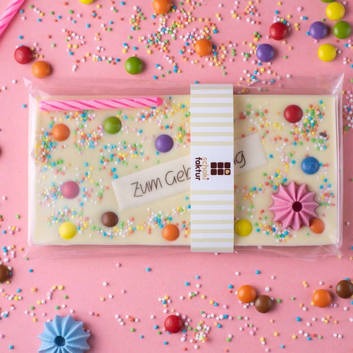 White Birthday Chocolate "Pink Candle" for wholesale by Schokifaktur