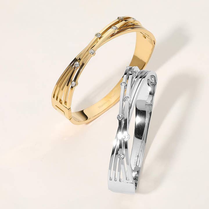 Stainless Steel Bezel Split Twisted Hinged Bangle Bracelet for wholesale by Sensibling Corp.