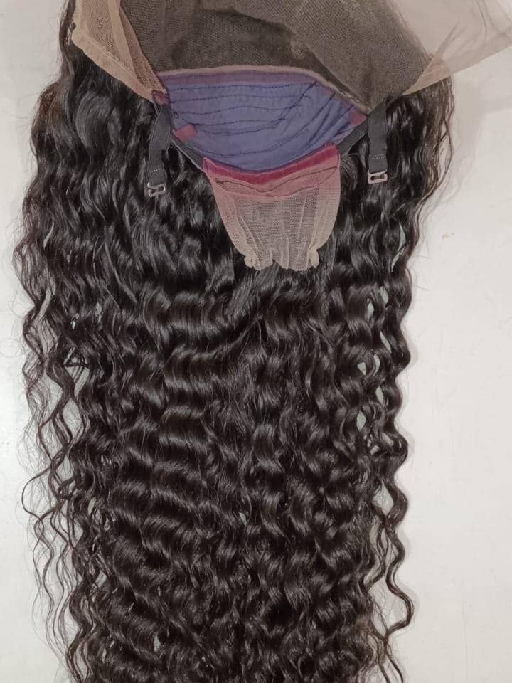 Indian Curly Human Hair Wig: 4x4 Lace Closure for wholesale by Gaurash Beauty Supply Inc.