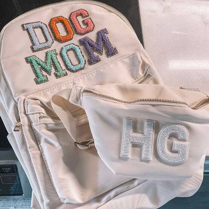 Beige Nylon Backpacks for wholesale on Faire24