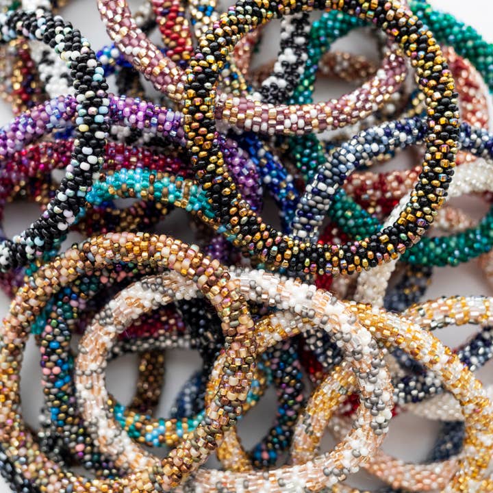 Aid Through Trade - Vendita all'ingrosso Bracciale con perline - Braccialetto Roll-On® originale FW24 Party Pack