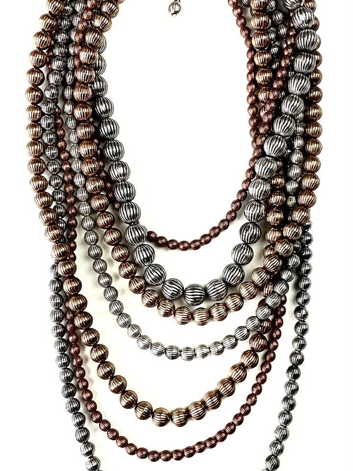 CN977 NK MULTI STD. MIXED METAL FLUTED BEADS for wholesale by Lost & Found Trading