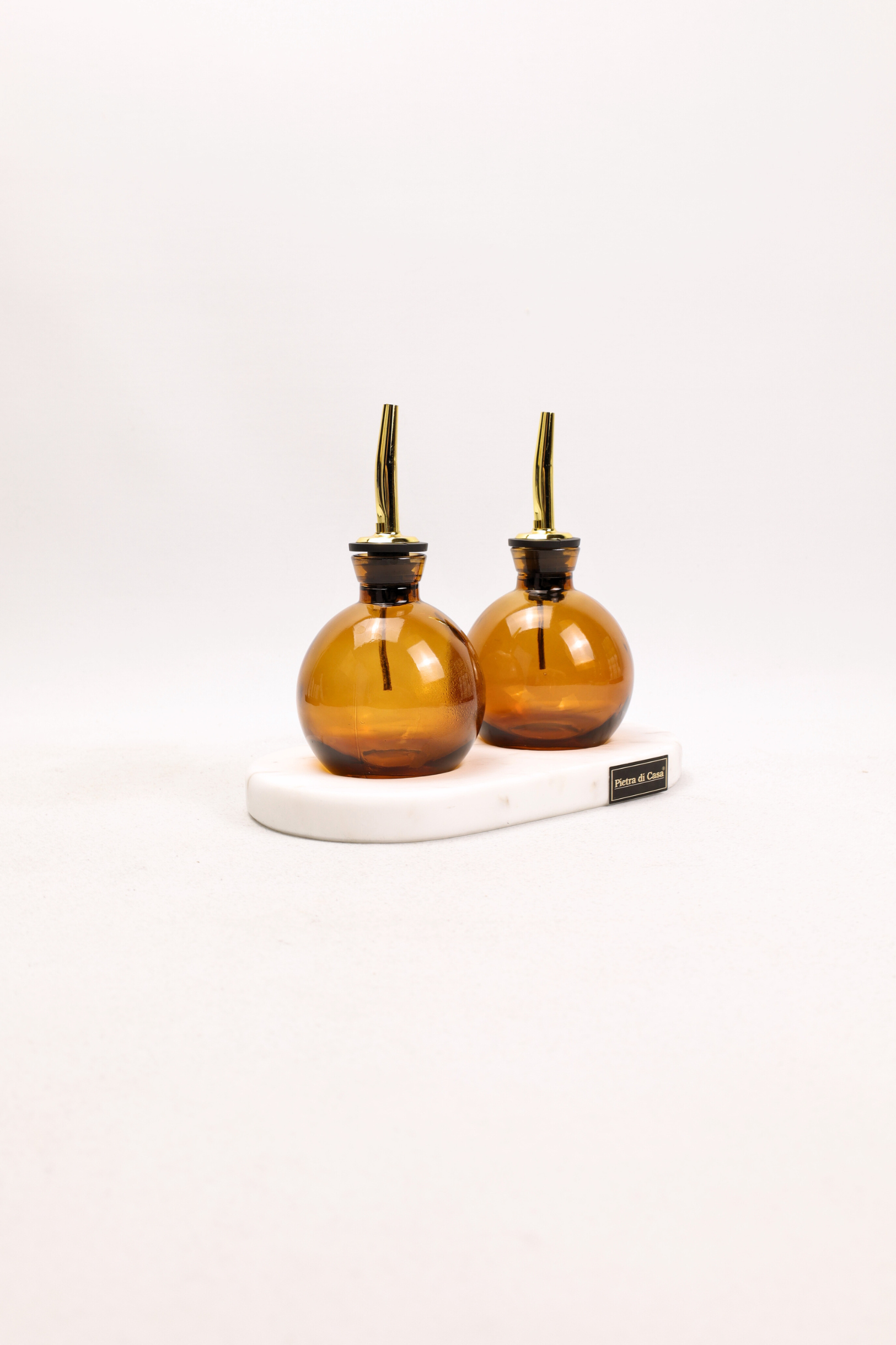PIETRA DI CASA - Wholesale Oil/Vinegar Dispenser - Stone Oil & Vinegar Cruet Set AILA– Minimalist Table Design1