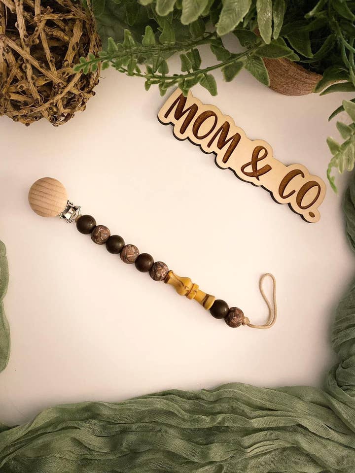 Duck Call Pacifier Clip for wholesale by Mom & Co.