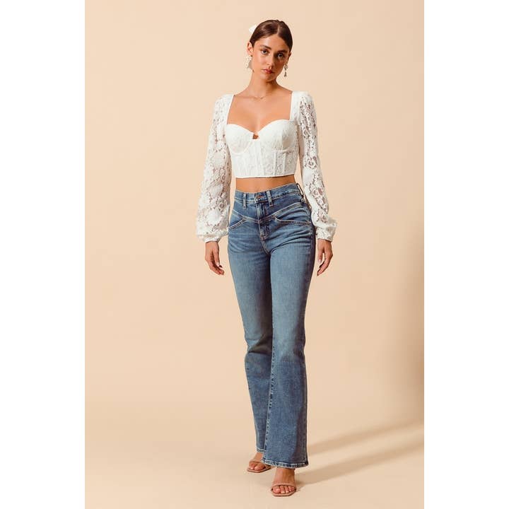 DENIM MID RISE YOKE CUT FLARE BOTTOM LONG LENGTH JEANS for wholesale on Faire