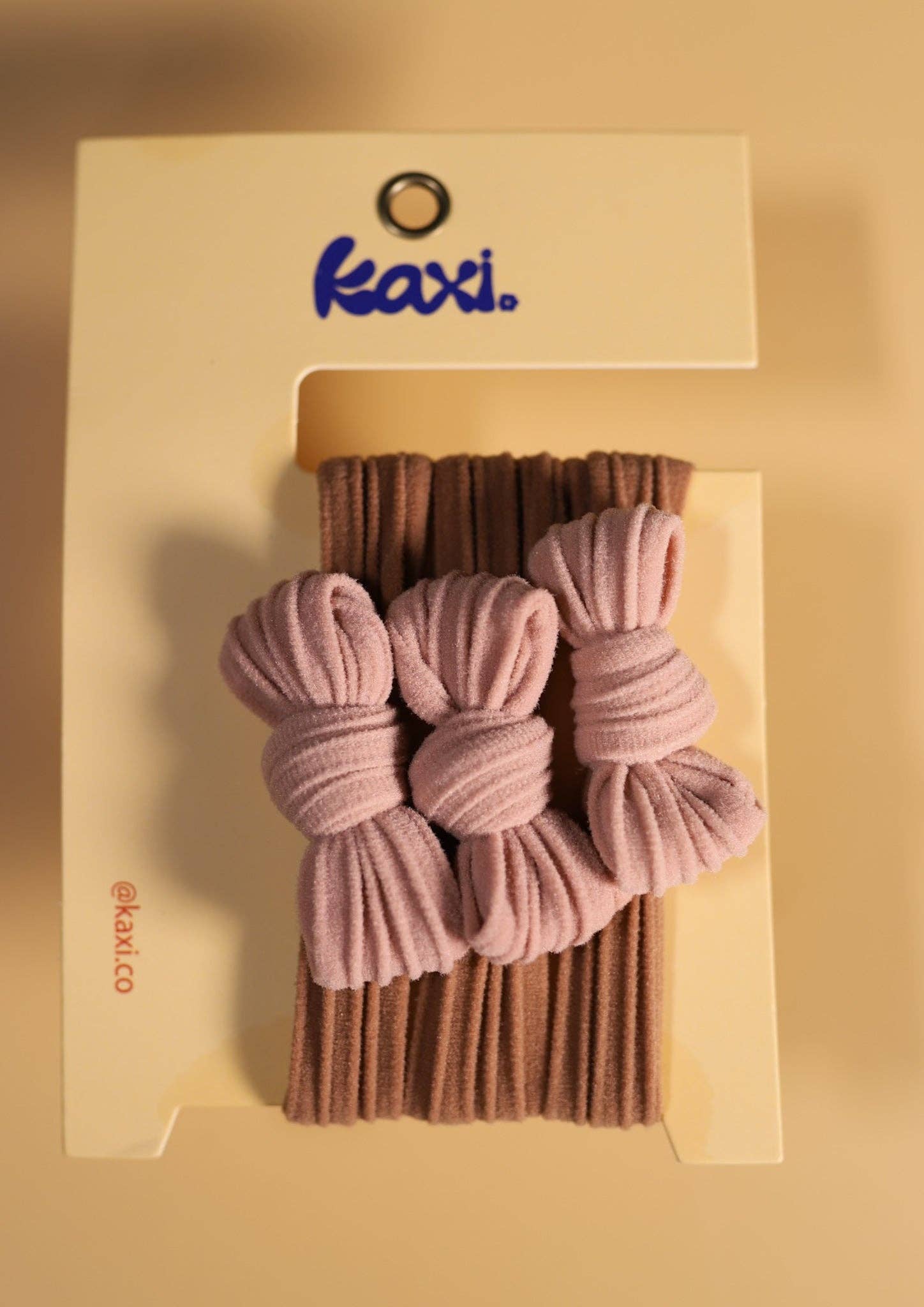 KAXI – wholesale Hårsnoddar – Dam – Tvåfärgade rosetter med bakåtslickat hårband24