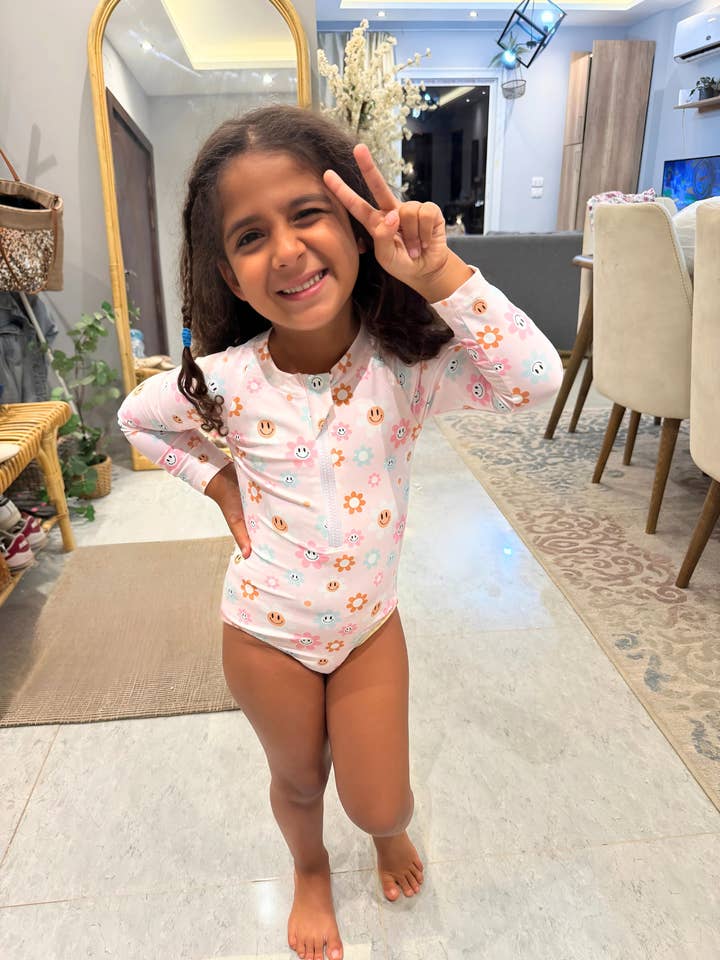 Blush Break – Retro Floral Rashguard Swimsuit for wholesale by Uncommon Lane