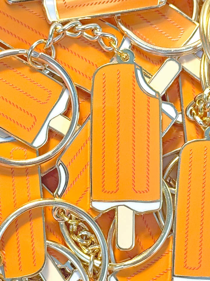 Orange Creamsicle Enamel Keychain - 2 in x .75 in for wholesale by Studio Pop Online