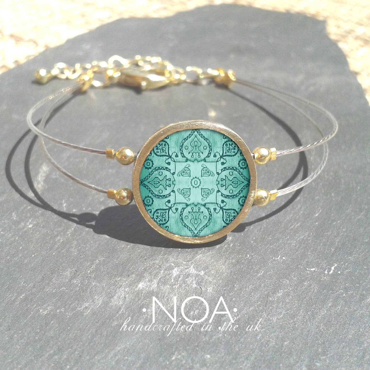 Noa Jewellery – wholesale Charm/dangle bracelet – Round Ceramic Bracelet, Gold Plated Stainless Steel Frame8
