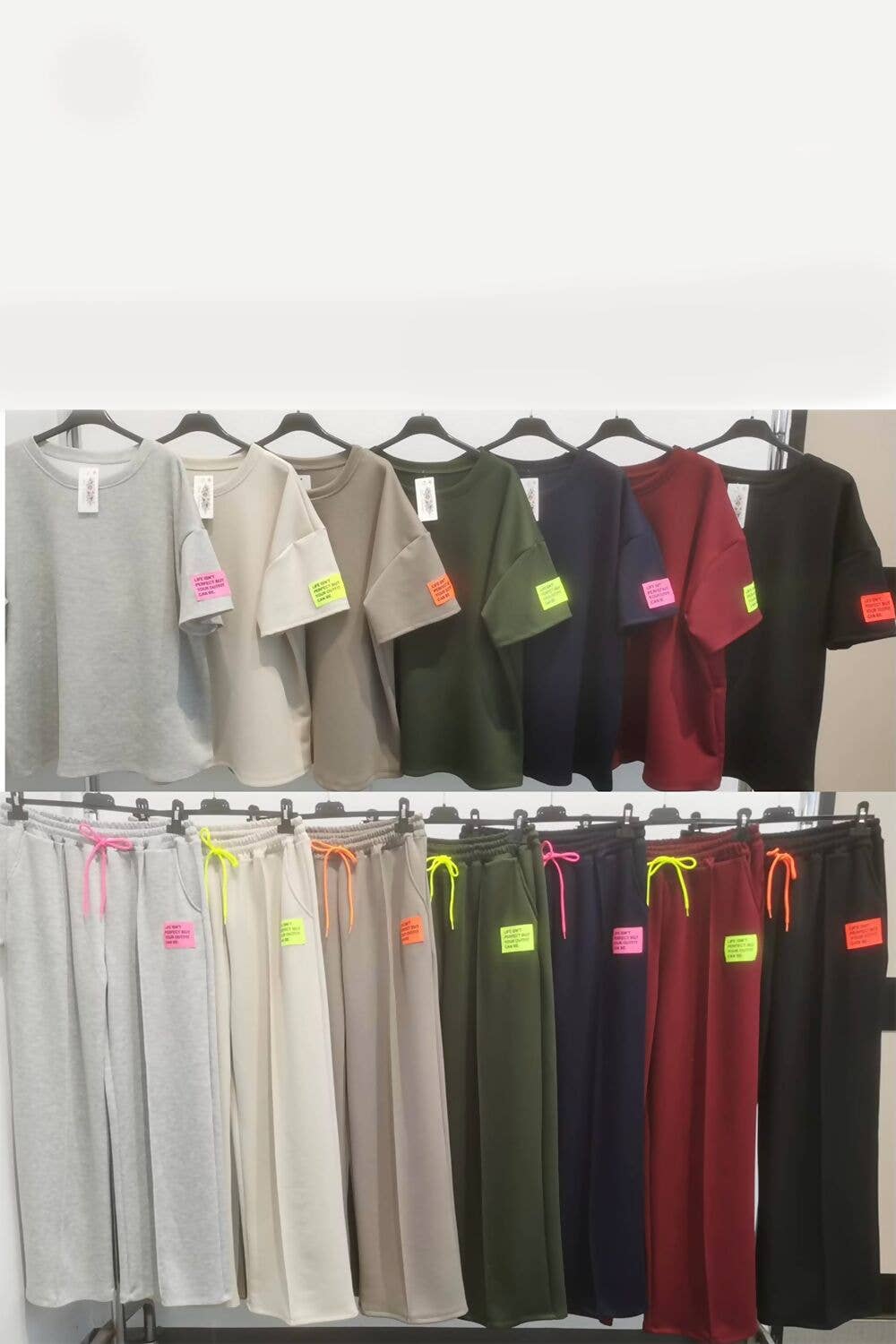 J5FASHION - Wholesale Lounge Set - Women's - GRAPHIC BADGE BAGGY T-SHIRT WITH WIDE LEG TROUSER3