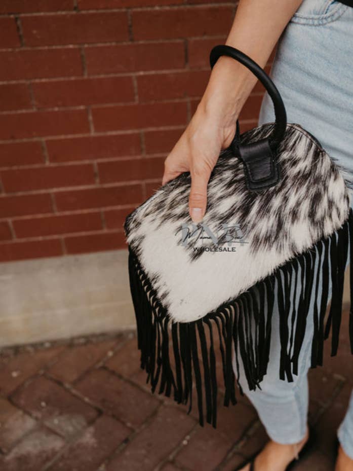cowhide wristlet clutch with fringe for wholesale by FRINGE & LUXE