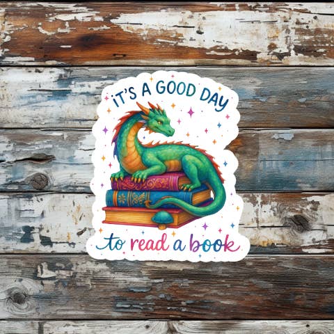Pegatina de vinilo troquelada «Dragón arcoíris - Buen día para leer un libro» para venta al por mayor de Prairie Chicken Sticker Shop & Gifts