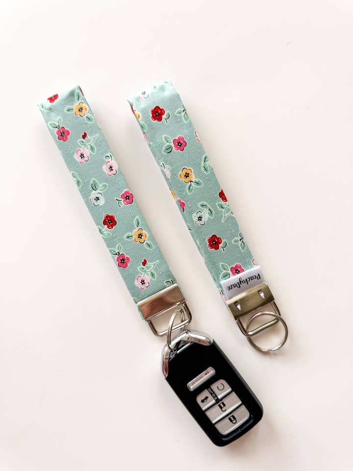 Teal Blossom Keychain Wristlet for wholesale by Peachy Daze Boutique