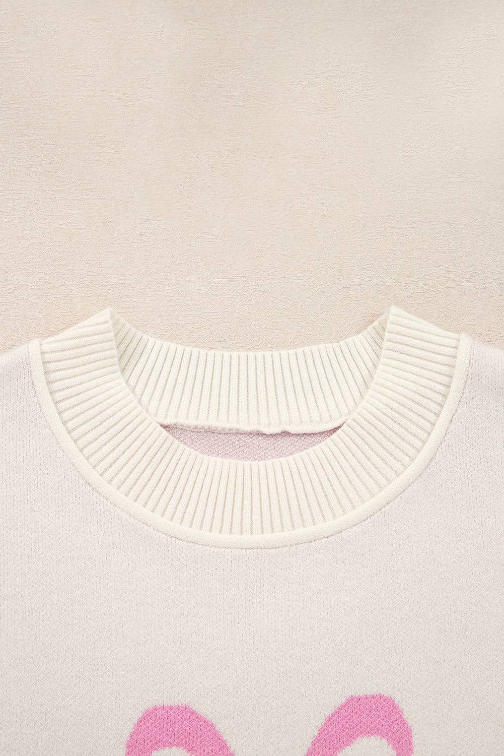 Pink Bow Ribbed Trim Reverse Seam Drop Shoulder Sweater for wholesale on Faire2