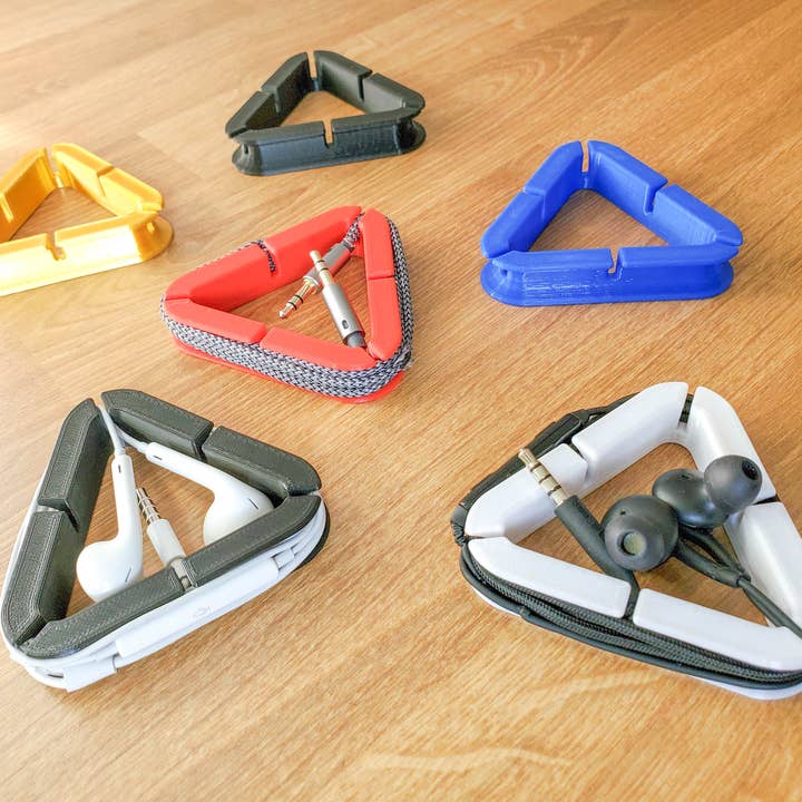 Headphone and cord organizers. for wholesale by Clever Contraptions