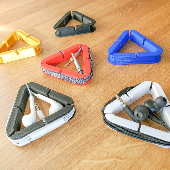 Clever Contraptions - Wholesale Cord Holder - Headphone and cord organizers.