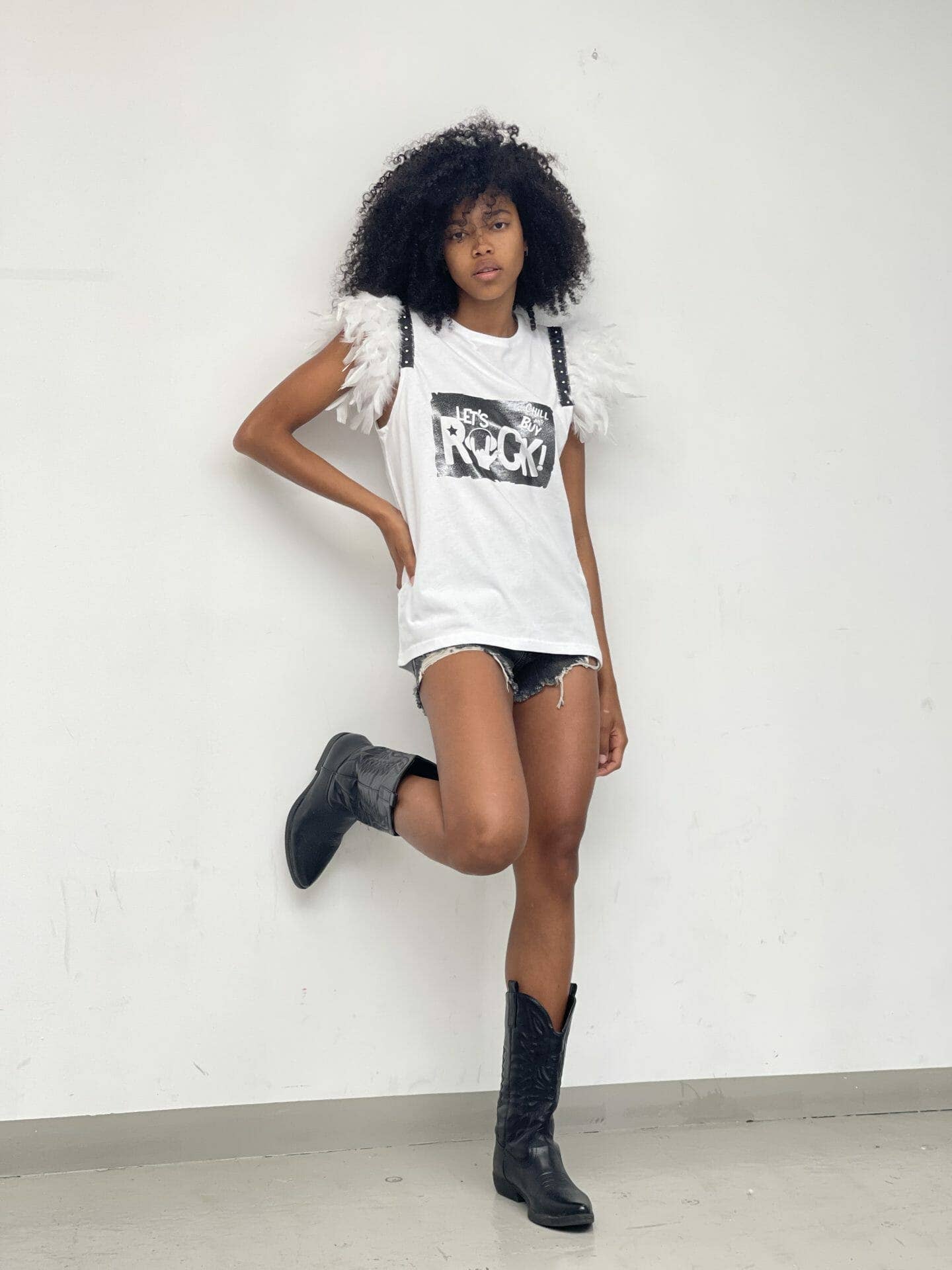 Blank White Feathered T-Shirt with Studs and Rock Silver Helmets for wholesale on Faire2