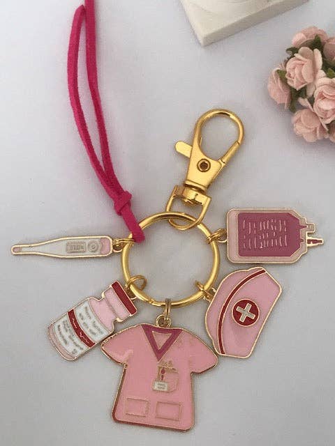 A trendy accessory, the elegant nurse-themed keychain, pink and gold charms, gift for a nurse, midwife, doctor for wholesale by Miss DJ Angel