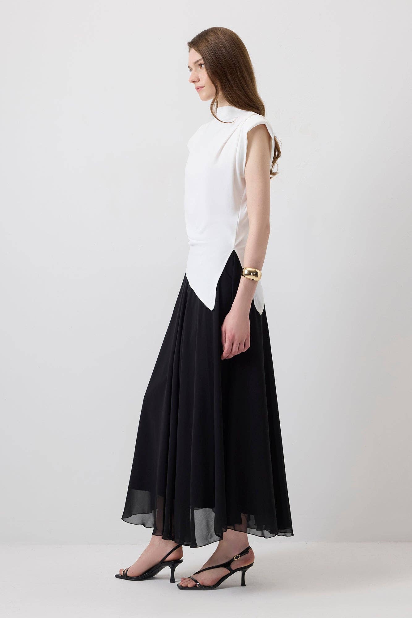 Ecru Blusa senza maniche con dettaglio asimmetrico in vita in vendita all'ingrosso su Faire1