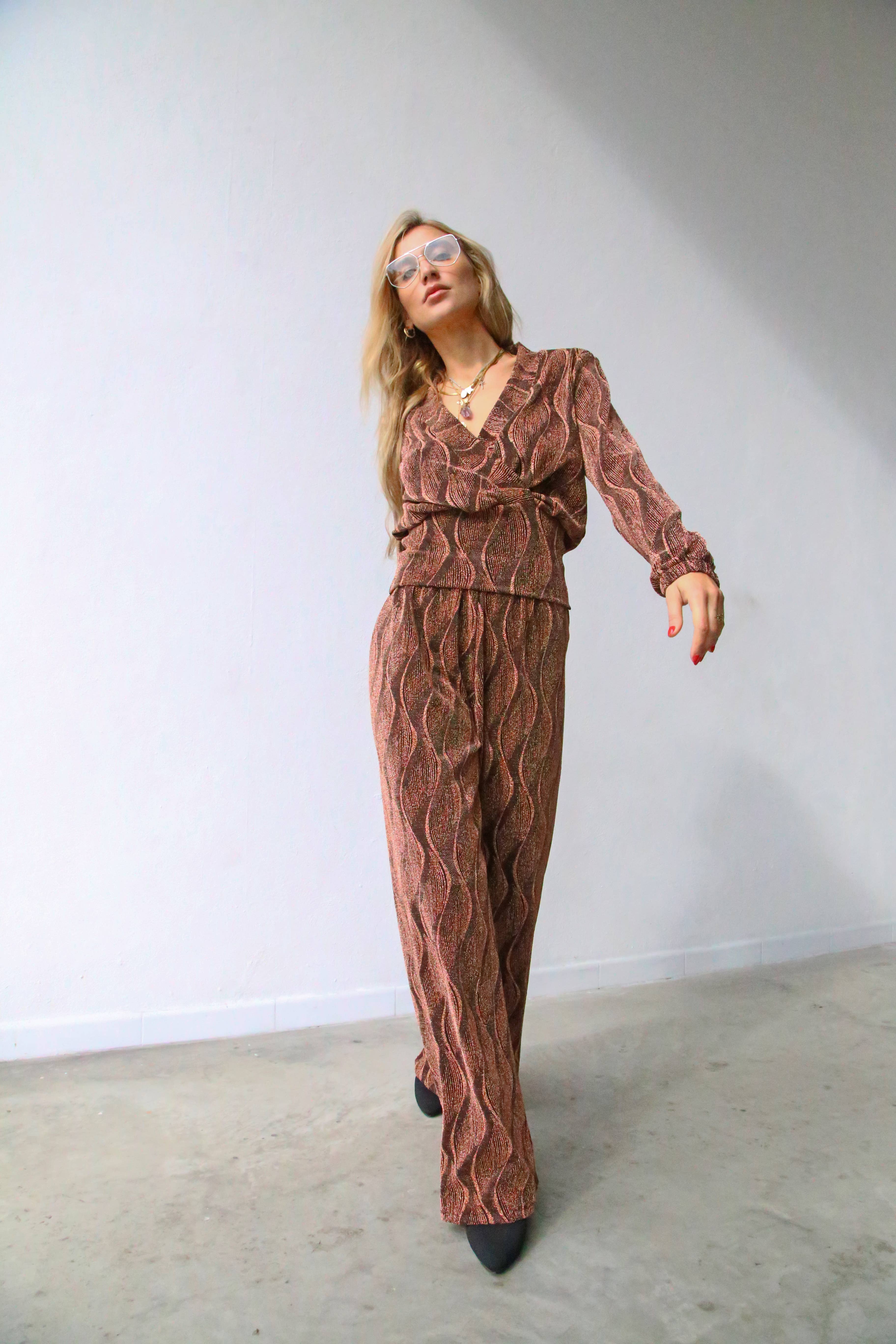 P3052 FLARED LUREX TROUSERS RUST for wholesale on Faire2