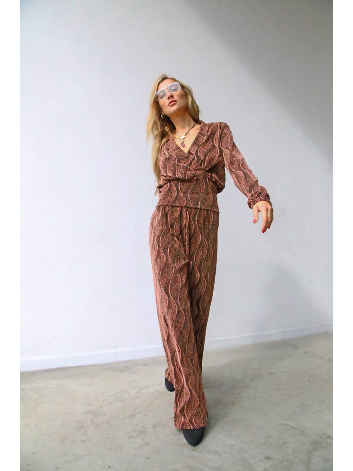 P3052 FLARED LUREX TROUSERS RUST for wholesale on Faire2