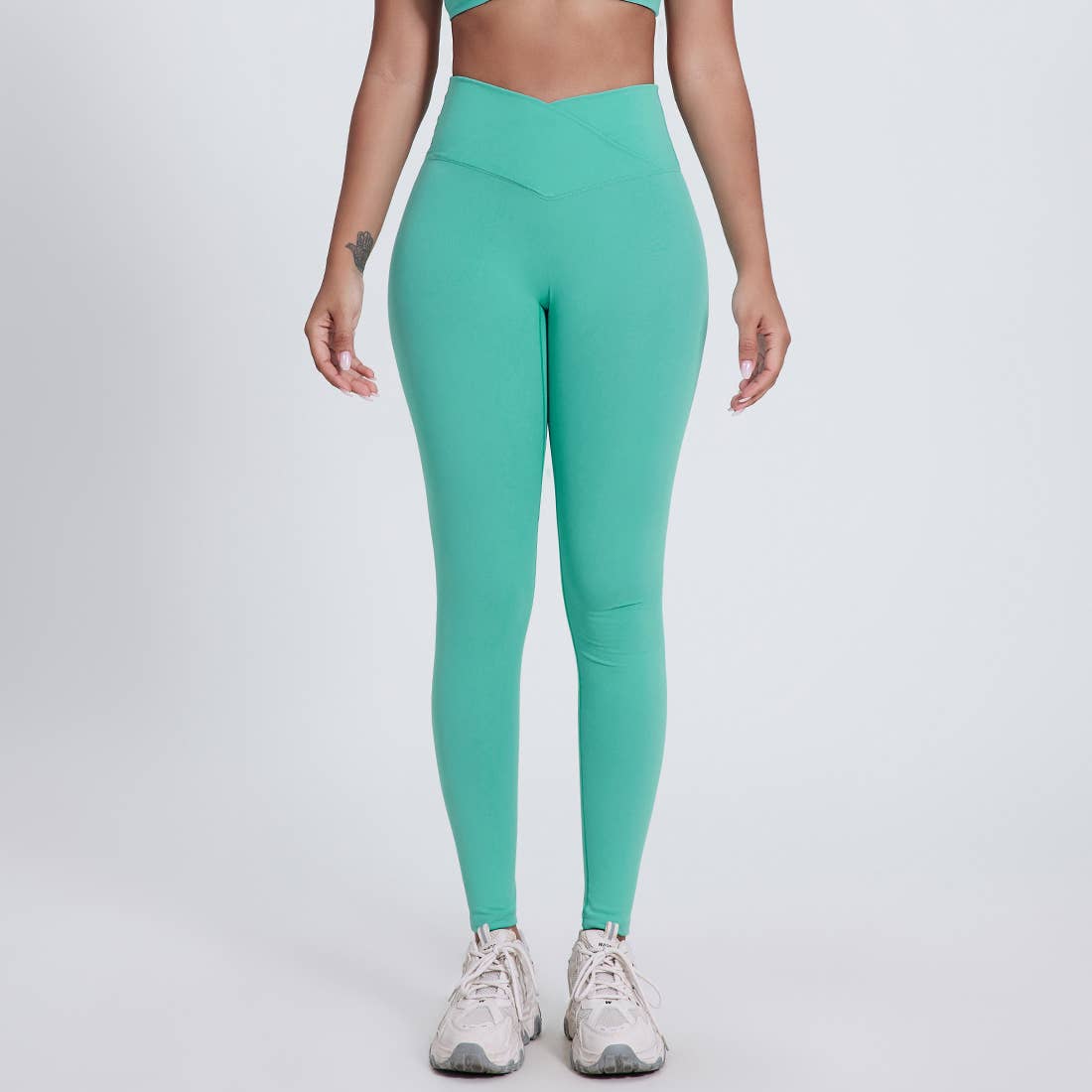 Sodalemon – Engroshandel Sports-/loungeleggings – til kvinder – Sodalemon dameleggings med krydset høj talje i ensfarvet design1
