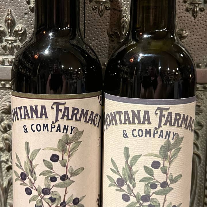 Mix case of Huckleberry Dark Vinegar & Huckleberry Olive Oil for wholesale by Montana Farmacy