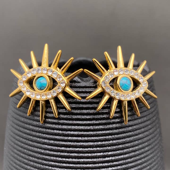 Boucles d'oreilles en acier inoxydable plaqué or 18K avec yeux maléfiques CZ - FGS pour la vente par Mio Queena