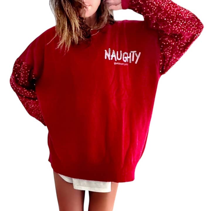 Pull en tricot peint 'Naughty Naughty' pour la vente par Wren + Glory