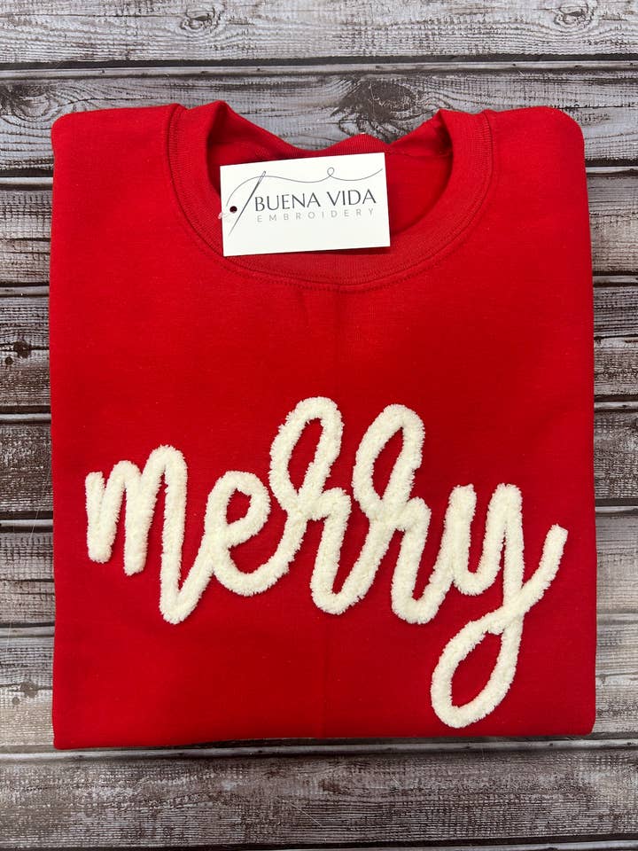 Red Merry Yarn Christmas Embroidered Crew Sweatshirt for wholesale on Faire