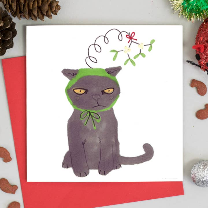 Tarjeta de Navidad festiva de gato en un beso me quick hat para venta al por mayor de Jo Clark Design