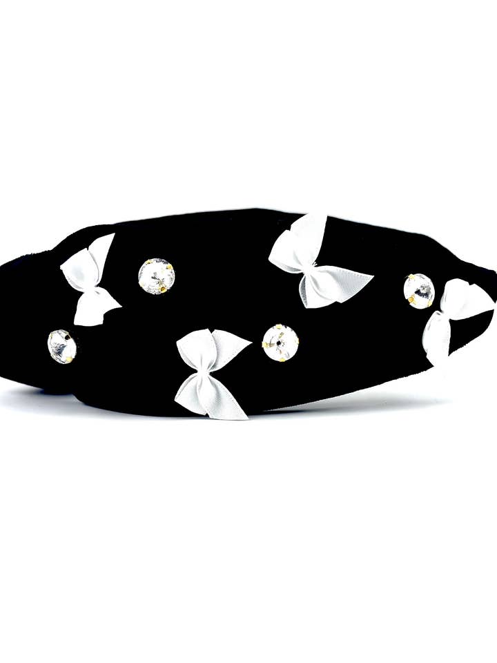 FASCIA PER CAPELLI IN VELLUTO NERO CON FIOCCO IN VENDITA per la vendita all'ingrosso da parte di Cora's Den