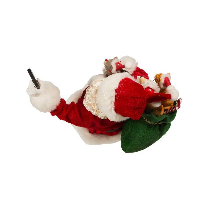 Kurt S. Adler, Inc. - Wholesale Christmas Decoration - 11"Fabriche Santa Taking Selfie
