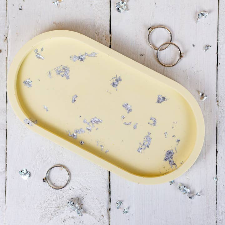 Jesmonite oval trinket tray, pastel yellow for wholesale by Nine Angels