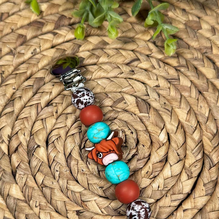 Western Highland Pacifier Clip for wholesale by Ridge & Co Teething Shop LLC