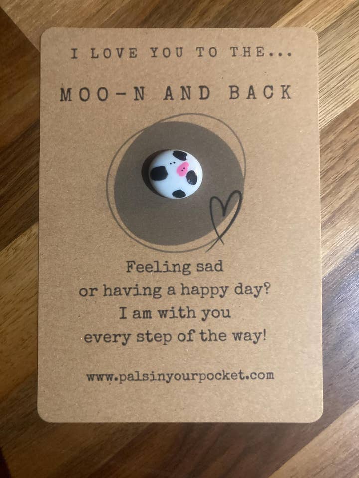 Moon And Back Cow Rock Pebble With Pocket And Hug for wholesale by Pals in your Pocket
